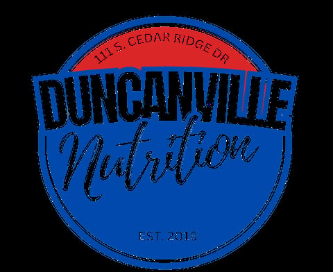 Duncanville Nutrition logo featuring a blue circular badge with red banner at top containing address, established 2019